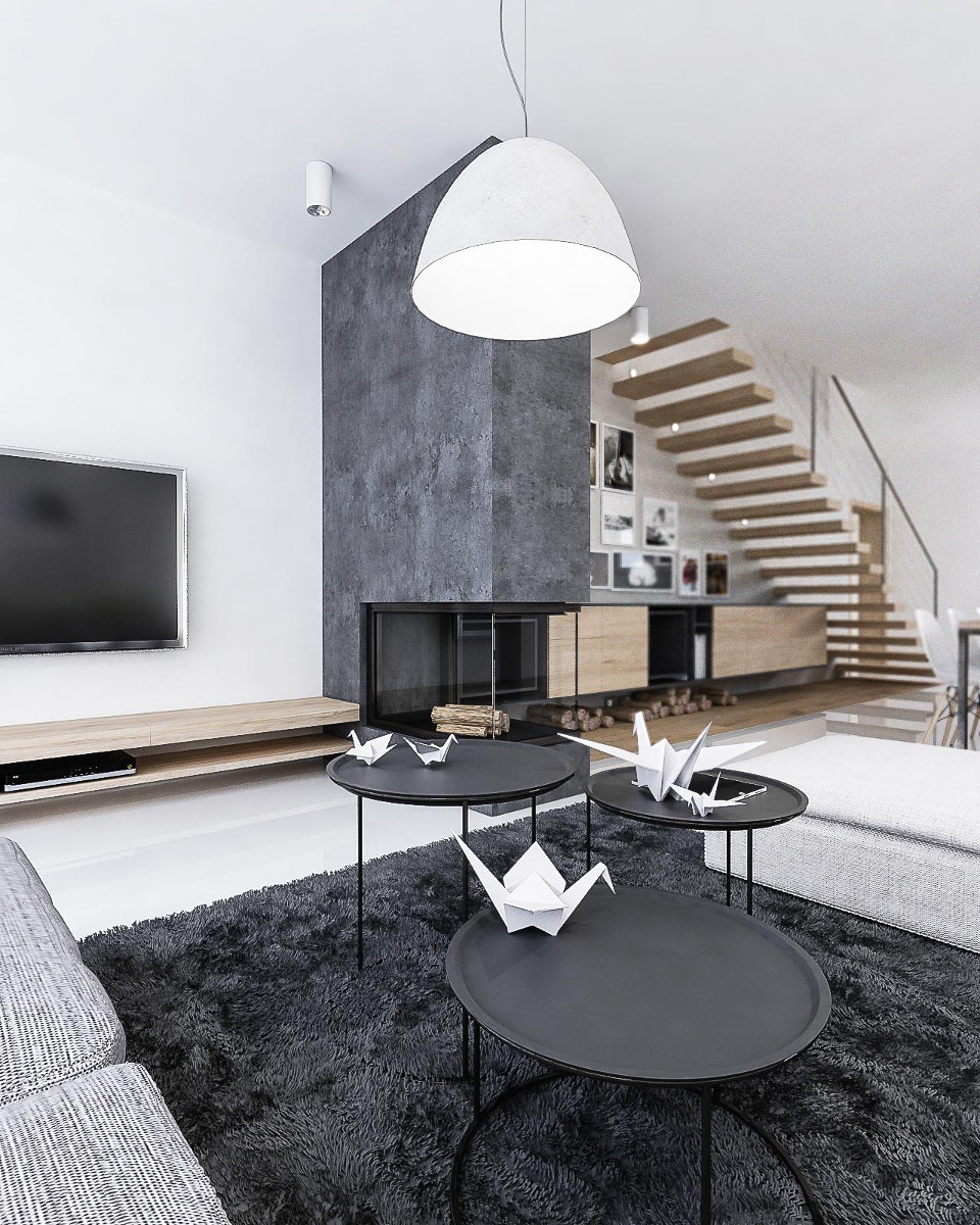 Obývacia izba s krbom, schodisko v interiéry, konferenčný stolík, škandinávsky dizajn